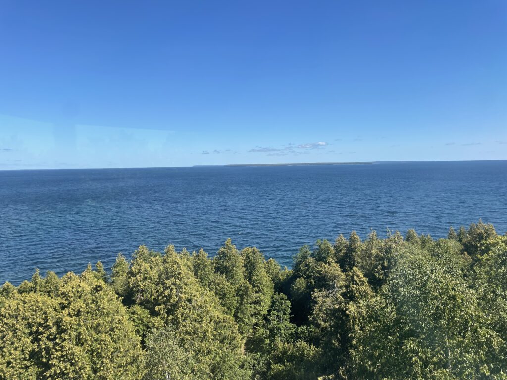 Other islands and distant Michigan shores as seen from the top of the light tower at the Rock Island lighthouse.