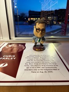 A Chris Farley bobblehead dressed as his SNL character: Matt Foley